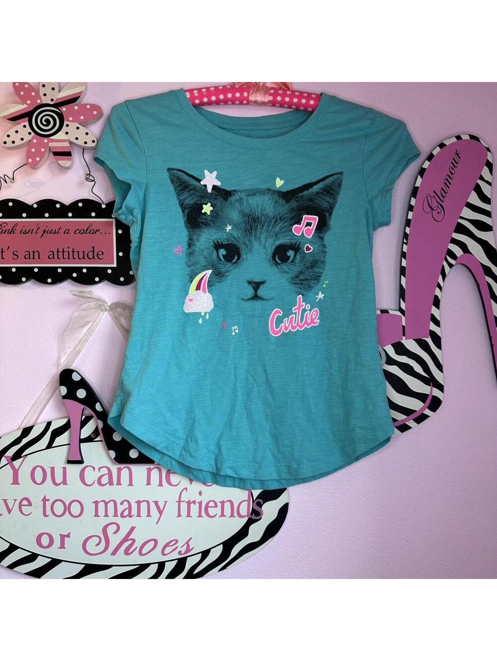 SO Teal graphic tee with adorable kitten print and “Cutie” text